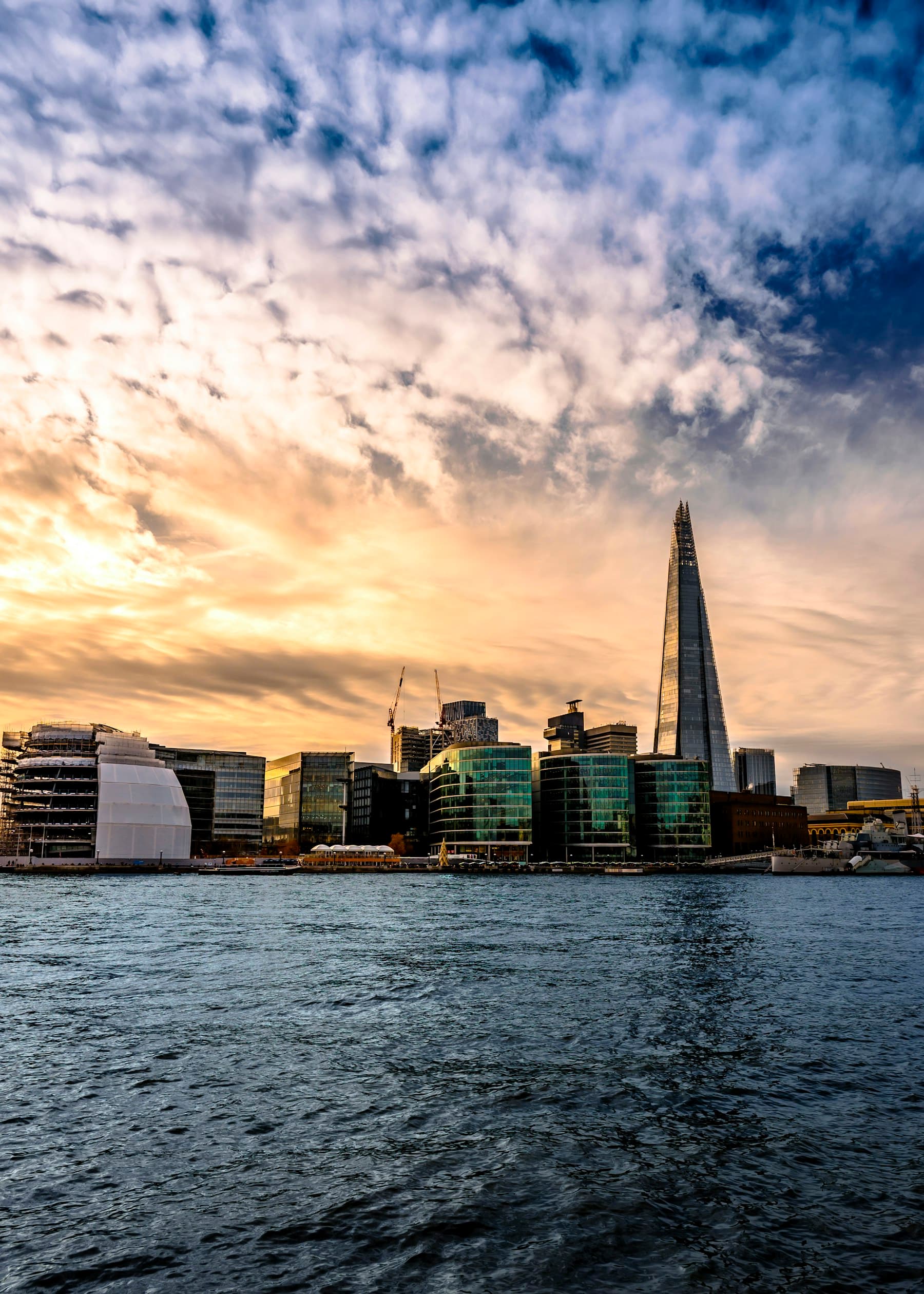 London skyline at blue hour with the Thames and city lights